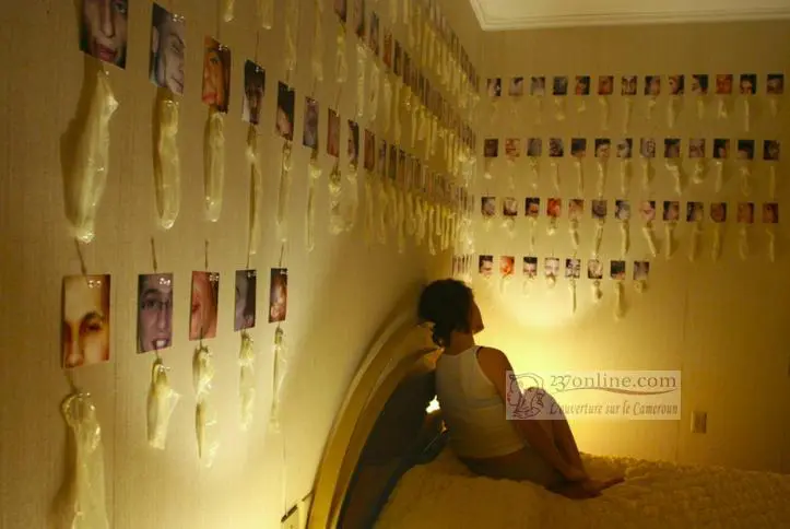 Norwegian girl collects used condoms and display them on the wall