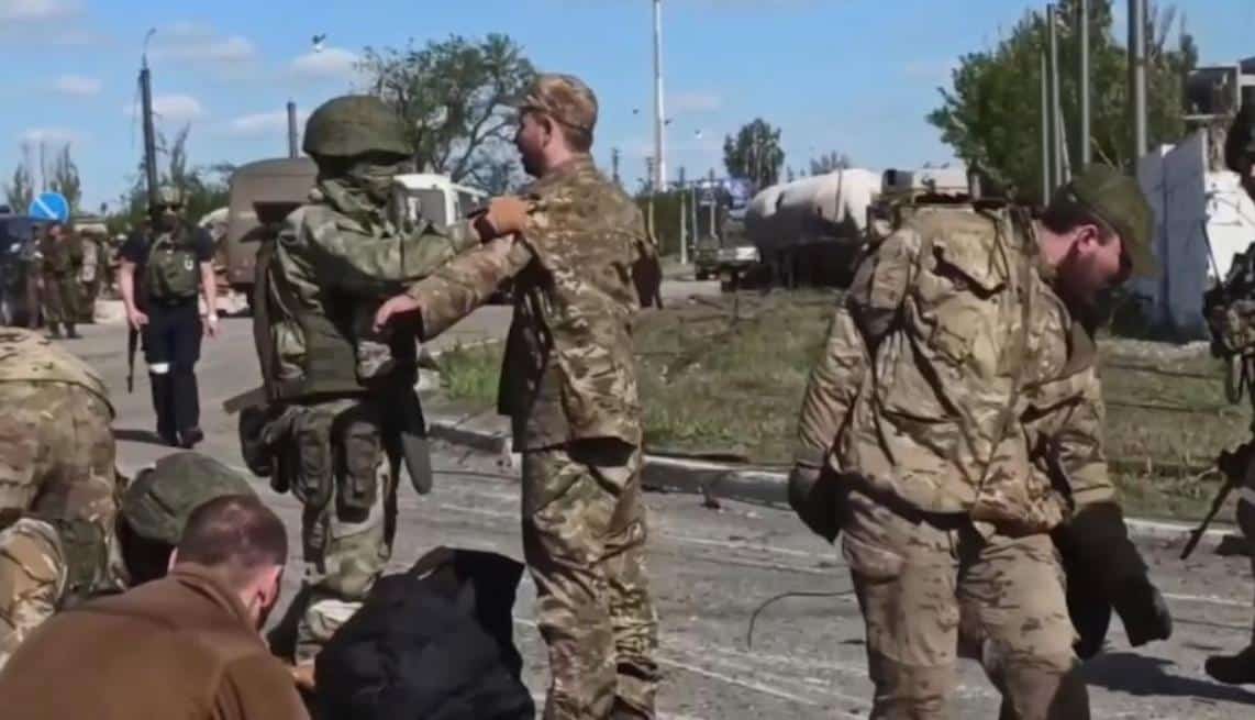 fighters of the nationalist Azov battalion surrender